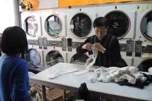 韩裔纷纷撤离纽约洗衣业 华裔新移民接手盼糊口