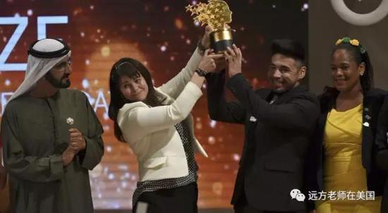 (照片中白色衣服的是麦吉老师）