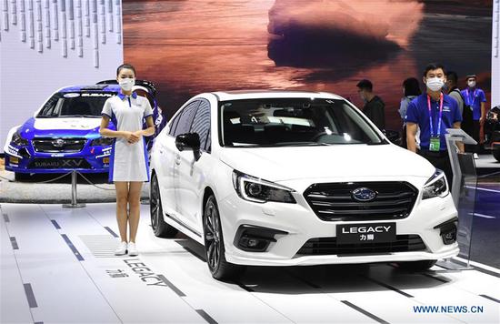 Photo taken on Sept. 26, 2020 shows cars displayed at the 2020 Beijing International Automotive Exhibition in Beijing, capital of China. The exhibition opened here on Saturday. (Xinhua/Ren Chao)