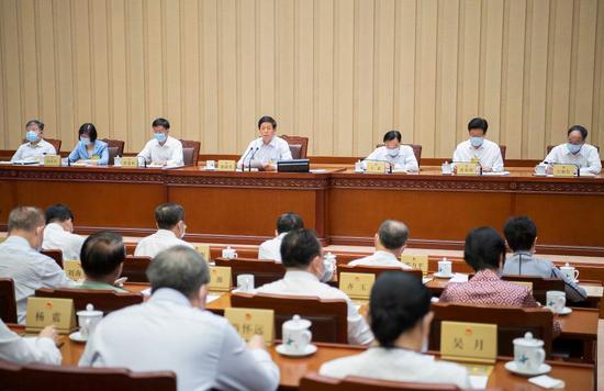 Li Zhanshu, chairman of the National People's Congress (NPC) Standing Committee, presides over the closing meeting of the 29th session of the 13th NPC Standing Committee at the Great Hall of the People in Beijing, capital of China, June 10, 2021. (Xinhua/Li Tao)