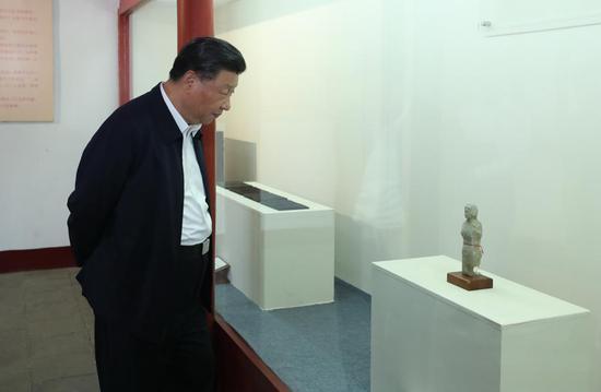 Chinese President Xi Jinping, also general secretary of the Communist Party of China Central Committee and chairman of the Central Military Commission, visits a memorial facility dedicated to Zhang Zhongjing, a famous Chinese pharmacologist and physician of the Eastern Han Dynasty (25-220), in Nanyang, central China's Henan Province, May 12, 2021. Xi learned about Zhang's life story and his contributions to the development of traditional Chinese medicine. Xi Jinping on Wednesday inspected the city of Nanyang in Henan Province. (Xinhua/Wang Ye)