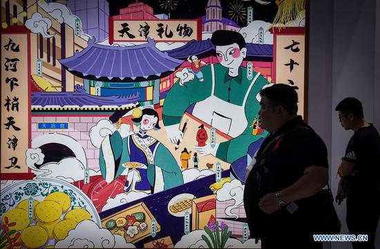 People visit the Tianjin Pavilion of the 15th China (Shenzhen) International Cultural Industries Fair in Shenzhen, south China's Guangdong Province, May 16, 2019. The fair held in Shenzhen attracts more than 21,000 overseas exhibitors from 103 countries and regions. (Xinhua/Mao Siqian)