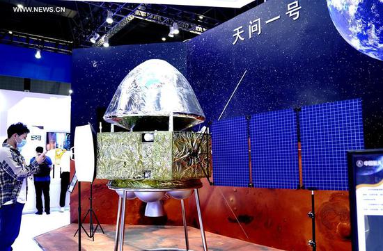 Photo taken on Sept. 15, 2020 shows the model of the Mars probe Tianwen-1 at the 22nd China International Industry Fair (CIIF) in east China's Shanghai. The 22nd CIIF kicked off at the National Exhibition and Convention Center (Shanghai) on Tuesday. Covering a total display area of 245,000 square meters, this year's CIIF has attracted more than 2,000 exhibitors from 22 countries and regions. (Xinhua/Zhang Jiansong)