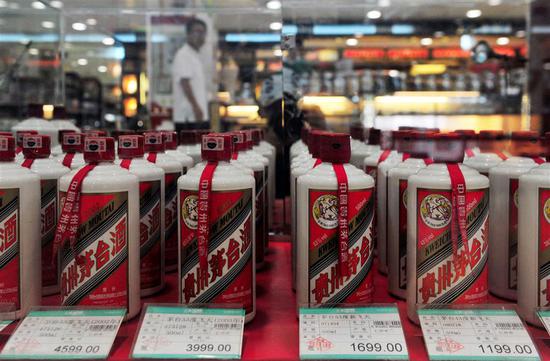 A glass case displaying various Moutai liquors is seen at a supermarket in Shenyang, Liaoning Province.