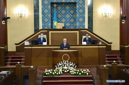 Kazakh President Kassym-Jomart Tokayev delivers the annual address to the nation in a parliamentary session in Nur-Sultan, Kazakhstan, on Sept. 1, 2020. Kazakh President Kassym-Jomart Tokayev delivered the annual address to the nation on Tuesday, outlining the main goals of the country's post-crisis development. (Kazakhstan's presidential press service/Handout via Xinhua)