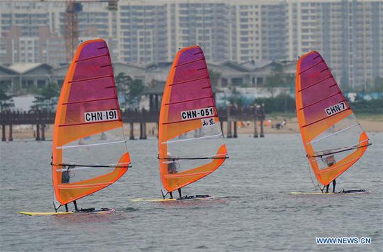 Huang Xianting of Fujian team competes during the women's RS:X class event at 2020 China's National Windsurfing Championships in Qinhuangdao, a coastal city of north China's Hebei Province, Sept. 2, 2020. (Xinhua/Yang Shiyao)