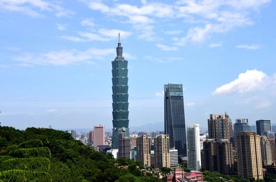 Photo taken on July 21, 2019 from Xiangshan Mountain shows the Taipei 101 skyscraper in Taipei, southeast China's Taiwan. (Xinhua/Zhu Xiang)