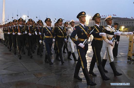 A flag-raising ceremony to celebrate the 71st anniversary of the founding of the People's Republic of China is held at the Tian'anmen Square in Beijing on Oct. 1, 2020. [Photo/Xinhua]