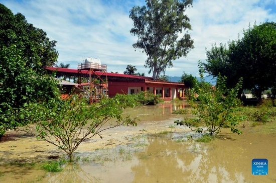 Photo taken on Oct. 19, 2021 shows a waterlogged area along the bank of river Ganga in the town of Haridwar, northern Indian state of Uttarakhand. The death toll in India's flood-hit state Uttarakhand rose to 34, the state's Chief Minister Pushkar Singh Dhami said on Tuesday after taking an aerial survey of the flood-affected areas. (Str/Xinhua)