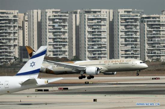 An airplane carrying the first official delegation from the United Arab Emirates (UAE) lands at the Ben Gurion international airport outside Tel Aviv, Israel, on Oct. 20, 2020. The first official delegation from the United Arab Emirates (UAE) landed in Israel on Tuesday and signed four bilateral agreements, according to a Youtube live broadcast by Israeli prime minister's office. (Gideon Markowicz/JINI via Xinhua)