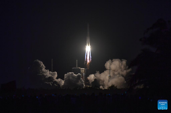 A Long March-7A rocket carrying two satellites blasts off from the Wenchang Spacecraft Launch Site in south China's Hainan Province, Dec. 23, 2021. The rocket blasted off at 6:12 p.m. (Beijing Time) at the Wenchang Spacecraft Launch Site in southern Hainan Province and soon sent Shiyan-12 01 and Shiyan-12 02 satellites into preset orbit. The mission marked the 402nd flight of the Long March carrier rockets. (Xinhua/Guo Cheng)