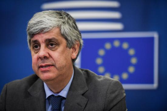 Portuguese Finance Minister and Eurogroup President Mario Centeno attends the press conference of a video meeting of the Eurogroup in Lisbon, Portugal, April 9, 2020. (European Union/Handout via Xinhua)