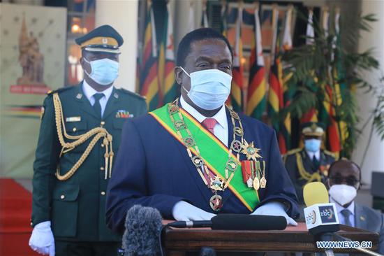 Zimbabwean President Emmerson Mnangagwa (front) gives a speech at the Heroes' Day Commemoration in Harare, Zimbabwe, on Aug. 10, 2020. Zimbabweans celebrated the 40th anniversary of Heroes' Day on Monday amid the COVID-19 pandemic that is ravaging the nation. (Photo by Wanda/Xinhua)