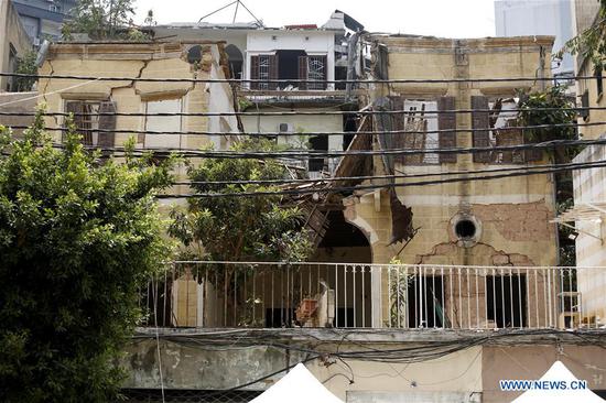 A damaged building is seen in Beirut, Lebanon, Aug. 13, 2020. A total of 601 heritage buildings were damaged due to the explosions that rocked Beirut on Aug. 4, of which 70 may fall if not quickly restored, the National News Agency reported on Wednesday. (Xinhua/Bilal Jawich)