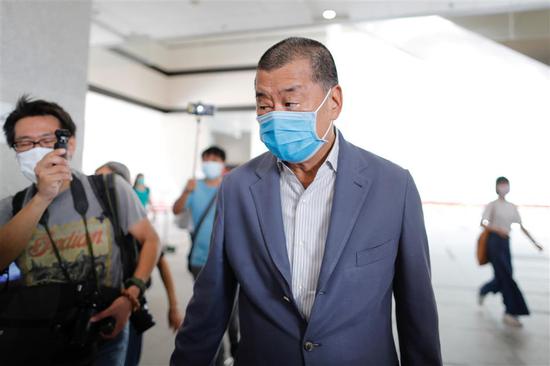 Jimmy Lai Chee-ying arrives at the West Kowloon Magistrates' Courts on August 20, 2020.