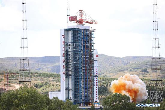 A Gaofen-11 02 satellite is launched by a Long March-4B rocket from the Taiyuan Satellite Launch Center in north China's Shanxi Province, Sept. 7, 2020. China launched a new optical remote-sensing satellite from the Taiyuan Satellite Launch Center in northern Shanxi Province on Monday. The Gaofen-11 02 satellite was launched by a Long March-4B rocket at 1:57 p.m. (Beijing Time), according to the center. It was the 345th flight mission by a Long March carrier rocket. (Photo by Zheng Taotao/Xinhua)