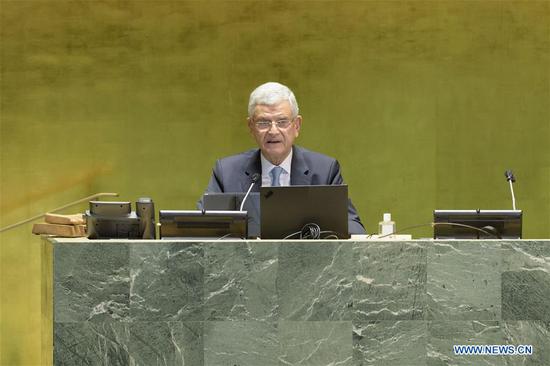 Volkan Bozkir, president of the 75th session of the United Nations General Assembly (UNGA), addresses a high-level meeting to commemorate the 75th anniversary of the UN at the UN headquarters in New York, on Sept. 21, 2020. UNGA president Volkan Bozkir on Monday stressed the importance of multilateralism, calling for collective efforts for a better future. (Manuel Elias/UN Photo/Handout via Xinhua)