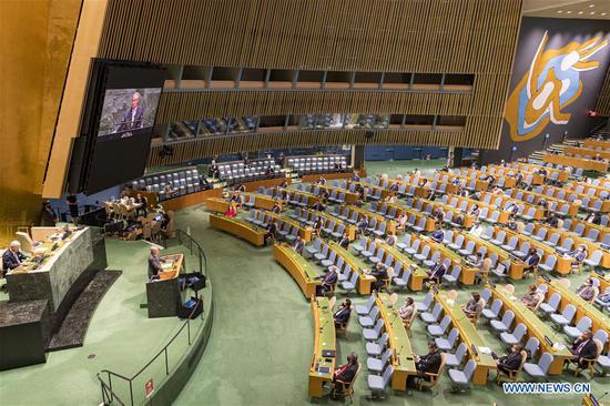 Volkan Bozkir, president of the 75th session of the United Nations General Assembly(UNGA), addresses the General Debate of the 75th session of the UN General Assembly at the UN headquarters in New York on Sept. 22, 2020. The General Debate of the 75th session of the UN General Assembly opened on Tuesday with the theme of "The future we want, the United Nations we need: reaffirming our collective commitment to multilateralism -- confronting COVID-19 through effective multilateral action." (Rick Bajornas/UN Photo/Handout via Xinhua)