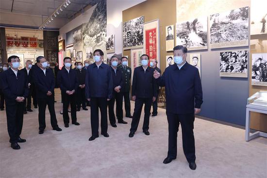 Xi Jinping and other Communist Party of China and state leaders Li Keqiang, Li Zhanshu, Wang Yang, Wang Huning, Zhao Leji, Han Zheng and Wang Qishan visit an exhibition commemorating the 70th anniversary of the Chinese People's Volunteers (CPV) army entering the Democratic People's Republic of Korea (DPRK) in the War to Resist U.S. Aggression and Aid Korea at the Military Museum of the Chinese People's Revolution in Beijing, capital of China, Oct. 19, 2020. (Xinhua/Ju Peng)