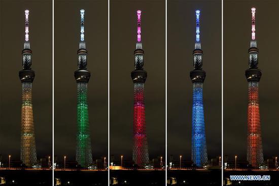 Combo photo shows Tokyo Skytree being illuminated with a lighting pattern specially designed in the 17 colors of Sustainable Development Goals (SDGs) (5 of them in picture) in Tokyo, Japan, Oct. 24, 2020. This special illumination of Skytree, designed to boost momentum toward achieving SDGs and to commemorate the 75th anniversary of the UN, will continue till Oct. 28, 2020. (TOKYO-SKYTREE/Handout via Xinhua) 