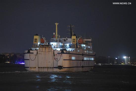 A roll-on roll-off ship departs from Xiuying Port in Haikou, south China's Hainan Province, Oct. 29, 2020. Ferry services across the Qiongzhou Strait have partially resumed from 4:00 p.m. Thursday as Typhoon Molave, the 18th this year, weakened. (Xinhua/Pu Xiaoxu) 