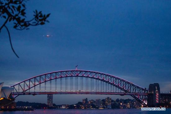 A specially painted plane of Qantas makes a 100-minute celebration flight over Sydney, Australia, Nov. 16, 2020, to mark the centennial of the airline. It has been 100 years since Australia's national airline Qantas was founded, making it one of the oldest continuously-operating airlines in the world, with a special place in the hearts of Australians. (Xinhua/Bai Xuefei)