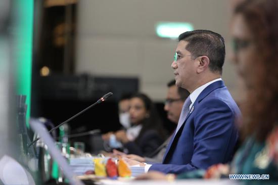 Malaysia's Minister of International Trade and Industry Mohamed Azmin Ali speaks during the virtually-held Asia-Pacific Economic Cooperation (APEC) Ministerial Meeting in Kuala Lumpur, Malaysia, Nov. 16, 2020. APEC's Post-2020 vision will promote an open, dynamic and resilient Asia-Pacific community in charting the direction of the region in the coming decades, Azmin said on Monday. (APEC/Handout via Xinhua)