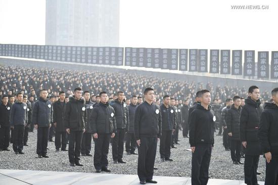 Photo taken on Dec. 13, 2020 shows the national memorial ceremony for the Nanjing Massacre victims at the Memorial Hall of the Victims of the Nanjing Massacre by Japanese Invaders in Nanjing, capital of east China's Jiangsu Province. (Xinhua/Li Xiang)