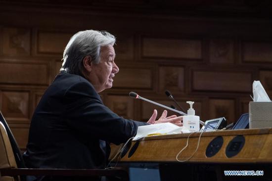 United Nations Secretary-General Antonio Guterres attends a virtual briefing to update on preparations for COP26, at the UN headquarters in New York, on Feb. 8, 2021. Guterres on Monday told the member states that 2021 is a "crucial year" for climate change. "2021 is a crucial year in the fight against climate change," the UN chief was speaking to a member states meeting as part of the preparations towards the latest annual UN climate conference, known as COP26, which will be held in Glasgow, Scotland, in November. Originally scheduled for last year, it had to be postponed due to the COVID-19 pandemic. (Eskinder Debebe/UN Photo/Handout via Xinhua)