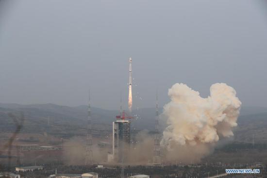 A Long March-4B carrier rocket carrying a satellite, the third of the Shiyan-6 series, blasts off from the Taiyuan Satellite Launch Center in north China's Shanxi Province on April 9, 2021. China successfully sent the experiment satellite into planned orbit Friday. (Photo by Zheng Taotao/Xinhua)