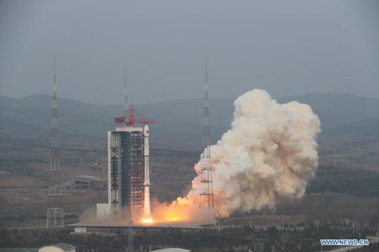 A Long March-4B carrier rocket carrying a satellite, the third of the Shiyan-6 series, blasts off from the Taiyuan Satellite Launch Center in north China's Shanxi Province on April 9, 2021. China successfully sent the experiment satellite into planned orbit Friday. (Photo by Zheng Taotao/Xinhua)