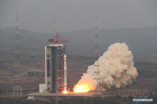 A Long March-4B carrier rocket carrying a satellite, the third of the Shiyan-6 series, blasts off from the Taiyuan Satellite Launch Center in north China's Shanxi Province on April 9, 2021. China successfully sent the experiment satellite into planned orbit Friday. (Photo by Zheng Taotao/Xinhua)