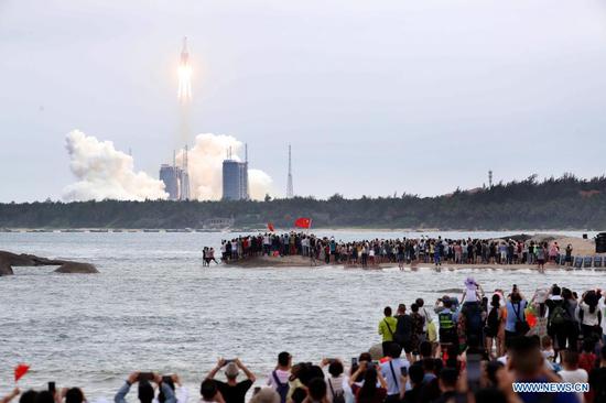 The Long March-5B Y2 rocket, carrying the Tianhe module, blasts off from the Wenchang Spacecraft Launch Site in south China's Hainan Province, April 29, 2021. China on Thursday sent into space the core module of its space station, kicking off a series of key launch missions that aim to complete the construction of the station by the end of next year. (Xinhua/Jin Liwang)