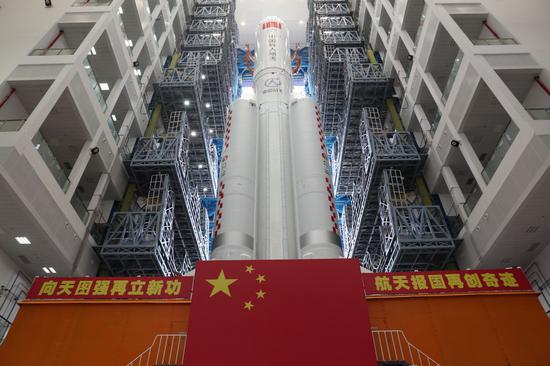 Photo taken on April 23, 2021 shows the combination of the core module of China's space station, Tianhe, and the Long March-5B Y2 rocket being transported to the launching area of the Wenchang Spacecraft Launch Site in south China's Hainan Province. (Photo by Guo Wenbin/Xinhua)
