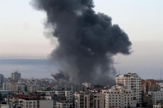 Smoke rises following Israeli airstrikes in Gaza City, May 12, 2021. (Photo by Rizek Abdeljawad/Xinhua)