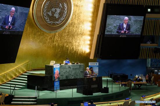 The president of the 75th session of the UN General Assembly Volkan Bozkir (at podium and on screens), addresses the General Assembly high-level thematic debate on the ocean and Sustainable Development Goal 14: Life Below Water, at the UN headquarters in New York on June 1, 2021. The world must harness "clear, transformative and actionable solutions" to address the ocean crisis, the president of the UN General Assembly (UNGA), or the PGA, said on Tuesday, opening a meeting to generate momentum towards the 2022 UN Ocean Conference, when public health safety measures allow. (Loey Felipe/UN Photo/Handout via Xinhua)