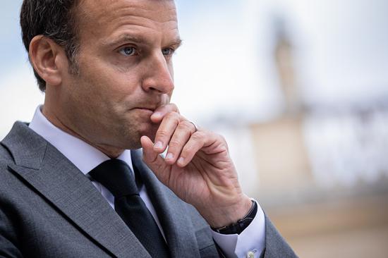 French President Emmanuel Macron attends a press conference with Secretary-General of North Atlantic Treaty Organization (NATO) Jens Stoltenberg (not in the picture) at the Elysee Palace in Paris, France, May 21, 2021. (Photo by Aurelien Morissard/Xinhua)