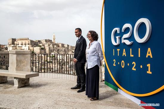 Italian Foreign Minister Luigi Di Maio (L) and Italian Deputy Minister for Foreign Affairs and International Cooperation Marina Sereni welcome participants for the meeting of the Group of 20 (G20) ministers of foreign affairs and development in Matera, Italy, on June 29, 2021. Ministers of foreign affairs and development from the world's 20 biggest economies on Tuesday called on the entire international community to build inclusive and resilient food chains, to ensure adequate nutrition for all, in line with the goal of "Zero Hunger" set for 2030. (Angelo Carconi/ANSA/Handout via Xinhua)