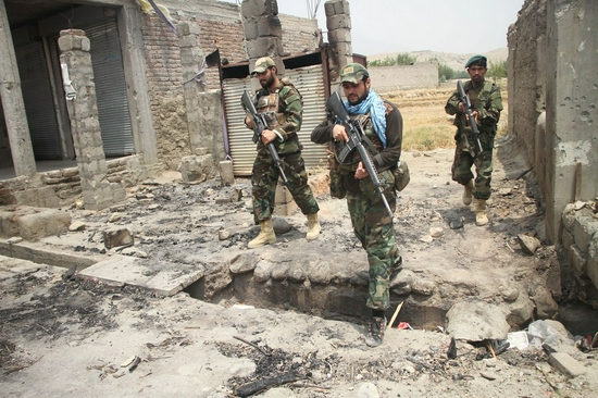 Afghan security force members take part in a military operation against Taliban militants in Alishing district of Laghman province, eastern Afghanistan, on July 12, 2021. (Photo by Saifurahman Safi/Xinhua)