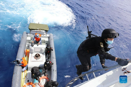 Members of the 38th escort fleet of the Chinese People's Liberation Army (PLA) Navy conduct a drill on May 20, 2021. A Chinese naval fleet Monday returned to a military port in Zhoushan, east China's Zhejiang Province, after concluding escort missions in the Gulf of Aden and the waters off Somalia. (Photo by Wang Zongyang/Xinhua)