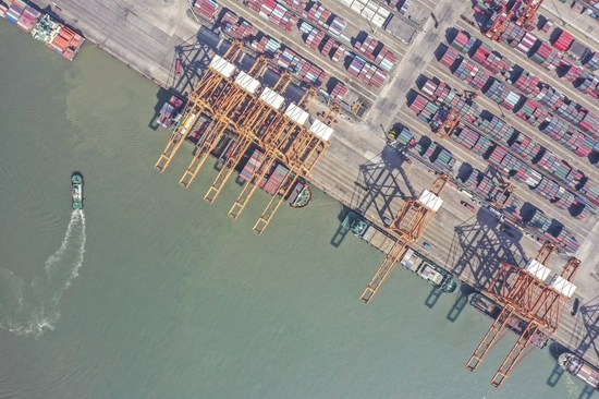 Aerial photo taken on Jan. 14, 2021 shows a view of the container wharf of Qinzhou Port, south China's Guangxi Zhuang Autonomous Region. (Xinhua/Cao Yiming)