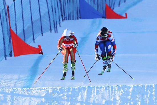 Skiers train at Genting Snow Park in Zhangjiakou, north China's Hebei Province on Nov. 23, 2022. The 2021 FIS Snowboard Cross and Freestyle Ski Cross World Cup, which also serve as Beijing 2022 test events, are held from Nov. 25 to 28. (Xinhua/Wu Diansen)