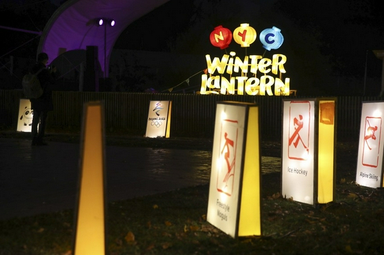 Light boxes displaying winter sports pictograms and elements of Beijing Winter Olympics are seen during a Winter Olympics-themed Day celebrated at Snug Harbor Cultural Center & Botanical Garden in New York, the United States, Dec. 11, 2021. (Xinhua/Wang Ying)