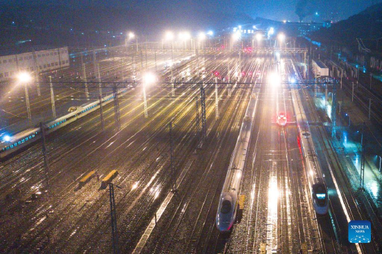 Aerial photo taken on Jan. 16, 2022 shows bullet trains at a train depot in Guiyang, southwest China's Guizhou Province. The number of railway passenger trips during China's upcoming Spring Festival travel rush is expected to jump 28.5 percent from the holiday season last year, industry data shows. During the 40-day travel season, also known as chunyun, many Chinese people will travel to meet their families for the Chinese Lunar New Year, or Spring Festival, which will fall on Feb. 1, 2022. (Xinhua/Ou Dongqu)