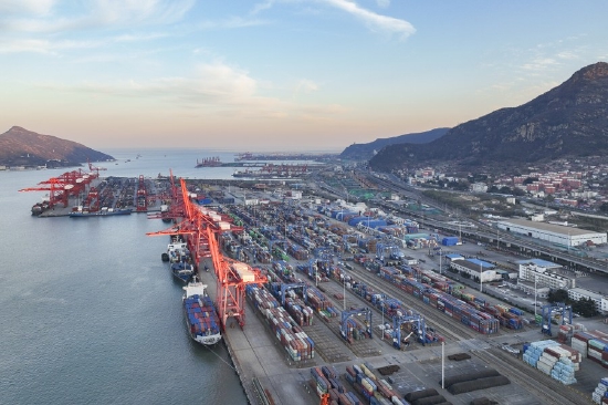 Aerial photo taken on Dec. 1, 2021 shows the container terminal in Lianyungang, east China's Jiangsu Province. (Photo by Si Wei/Xinhua)