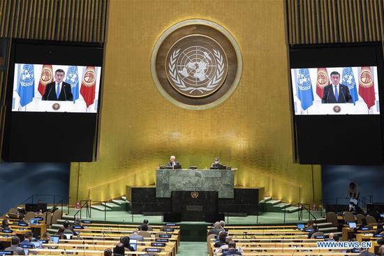 Kyrgyz President Sooronbai Jeenbekov (on the screens) addresses the General Debate of the 75th session of the UN General Assembly at the UN headquarters in New York, on Sept. 23, 2020. The General Debate of the 75th session of the UN General Assembly entered the second day on Wednesday. (Eskinder Debebe/UN Photo/Handout via Xinhua)