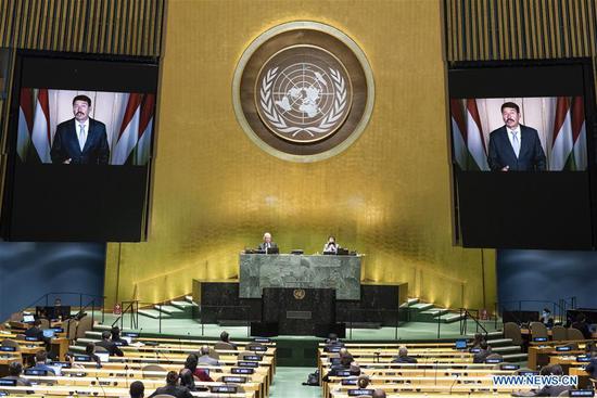 Hungarian President Janos Ader (on the screens) addresses the General Debate of the 75th session of the UN General Assembly at the UN headquarters in New York, on Sept. 23, 2020. The General Debate of the 75th session of the UN General Assembly entered the second day on Wednesday. (Eskinder Debebe/UN Photo/Handout via Xinhua)