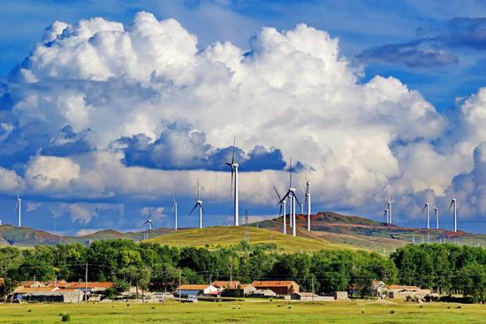 Photo taken on Sept. 8, 2015 shows a wind power plant in Zhangjiakou, north China's Hebei Province. (Xinhua/Yang Shiyao)