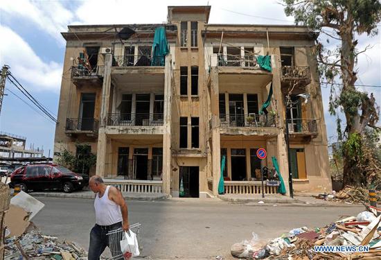 A damaged old building is seen in Beirut, Lebanon, Aug. 13, 2020. A total of 601 heritage buildings were damaged due to the explosions that rocked Beirut on Aug. 4, of which 70 may fall if not quickly restored, the National News Agency reported on Wednesday. (Xinhua/Bilal Jawich) 