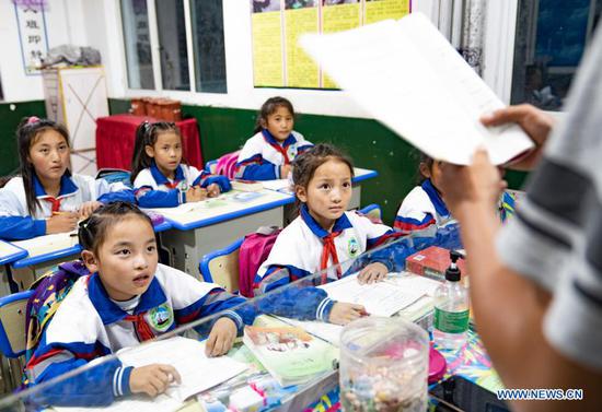 Students have class in Dobbar Township of Zongang County in Qamdo City, southwest China's Tibet Autonomous Region, Sep. 14, 2020. The Chinese government has, so far, spent more than 20 billion yuan on supporting the region's free education program, making education more accessible for nearly nine million students. Students across all grades can also access additional support through a number of projects and initiatives under 40 educational aid projects, providing grants and scholarships, among others. (Xinhua/Purbu Zhaxi)